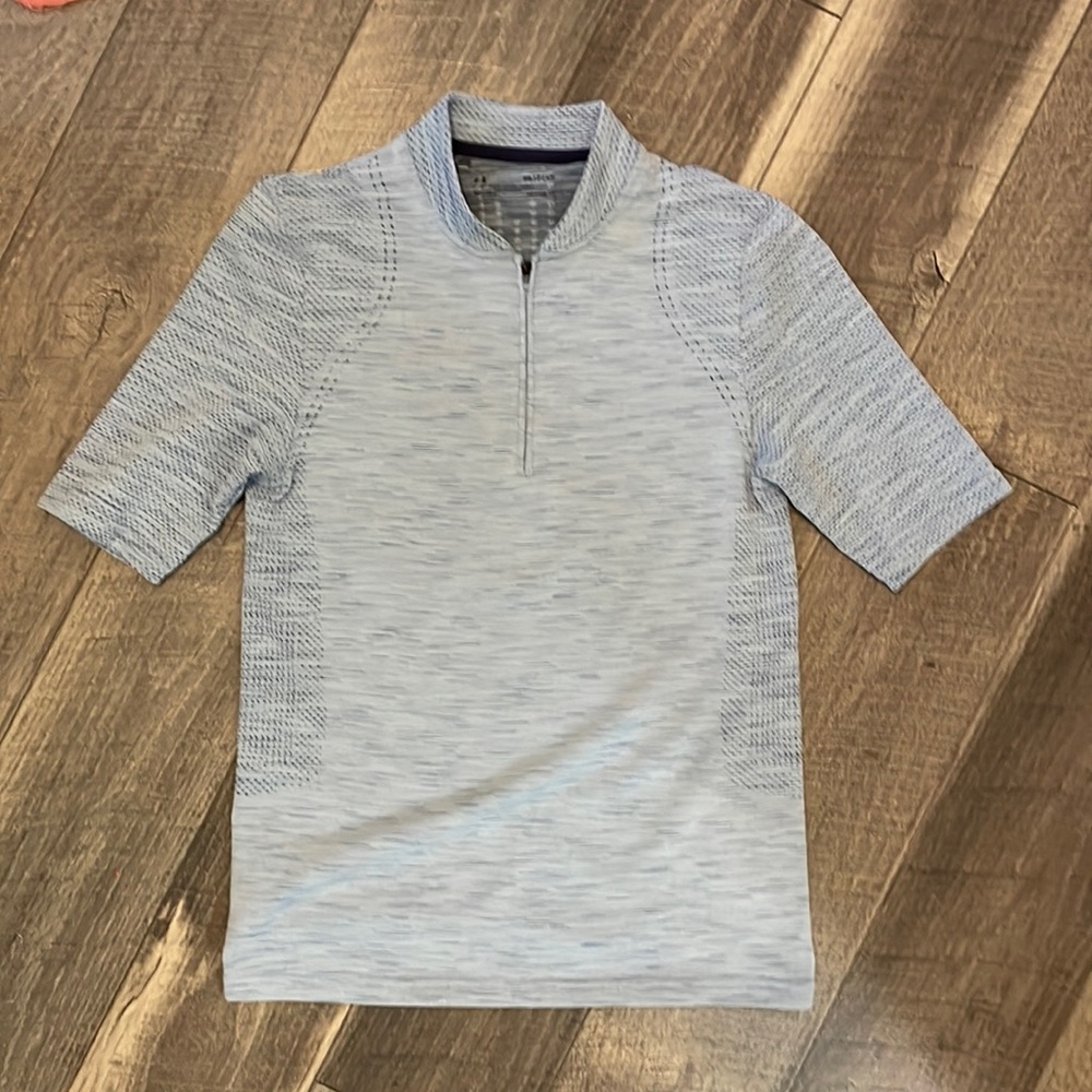 Ladies Under Armour golf shirt. Size small